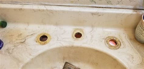 Lift the vanity top free from the cabinets carefully to minimize wall damage. How to remove bathroom vanity top rust stain | Terry Love ...