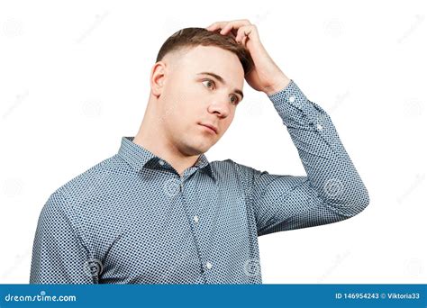 Portrait Of Young Thinking Guy Scratching Head Isolated On White