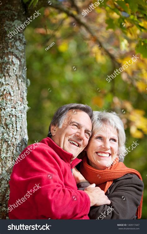 Happy Old Couple Laughing While Looking Stock Photo 140917447