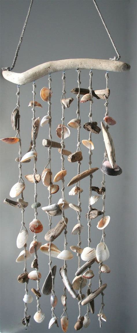 This Lovely Windchime Of Driftwood And Sea Shells Could Be Hang Inside