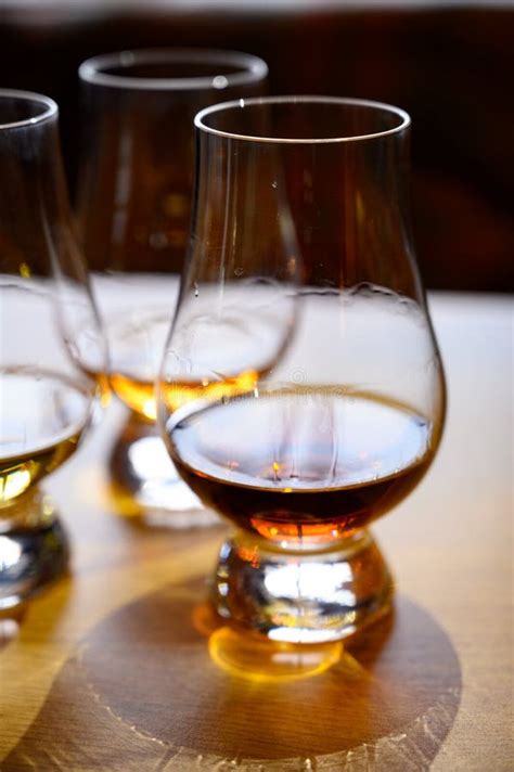 Flight Of Scottish Whisky Tasting Glasses With Variety Of Single Malts