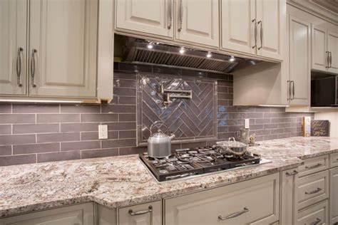 Our kitchen designers can help! White Torroncino Granite Countertop with Subway Tile ...