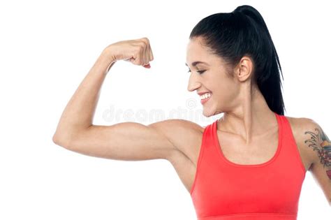 Female Trainer Showing Her Biceps Stock Photo Image Of Posing