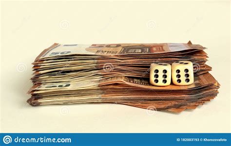 Dice And Money Two Sixes On Dice And Euro Banknotes Isolated On Yellow