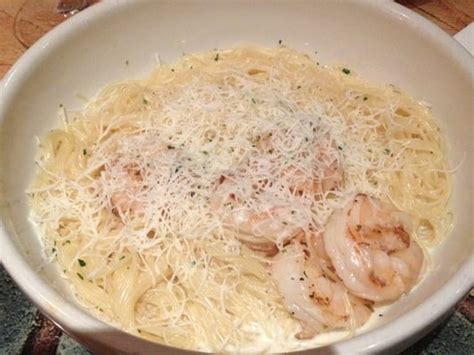 Return the shrimp to the pan, then add the basil and the remaining 2 tbs butter; Shrimp Alfredo with angel hair pasta. Absolute delish ...