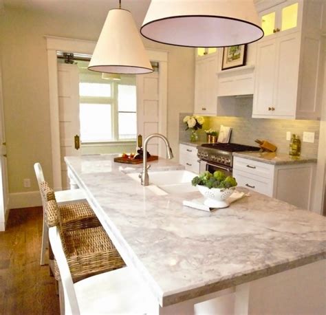 Alaska white granite countertops perfectly fitted this color combination in the kitchen. 25 Super White granite countertop ideas - the alternative to marble