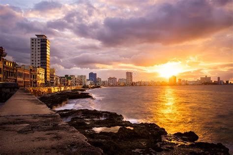 Romantic Sunset At The Malecon Seawall In Havana Stock Image Image Of
