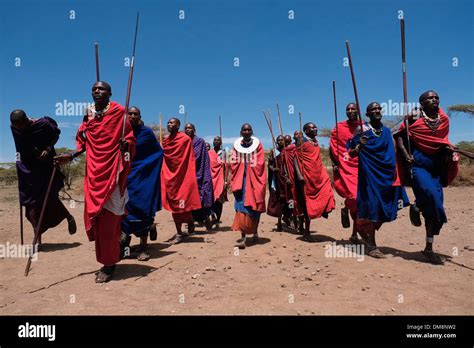 A Group Of Maasai Warriors Perform A Kind Of March Past During The