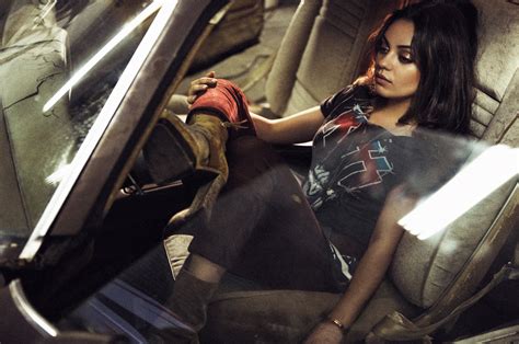 Celebrities Corner Mila Kunis Bends Over The Hood Of A Car