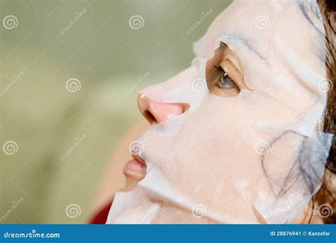 Portrait In Profile Woman Applying Rejuvenating Facial Mask On H Stock Image Image Of