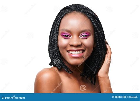 emotional portrait of happy african american girl pink make up visage white background stock