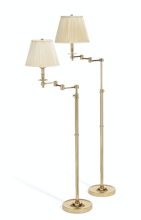 A Pair Of Brass Swing Arm Floor Lamps Modern Christies