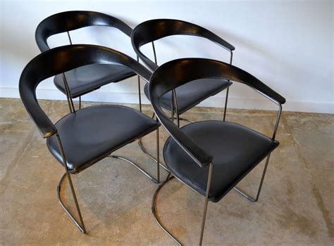 See more ideas about black dining chairs, dining chairs, black dining room. four black leather and gun metal chrome dining chairs by ...