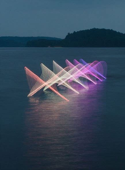 The Motions Of Canoers And Kayakers Revealed With Leds In Long Exposure