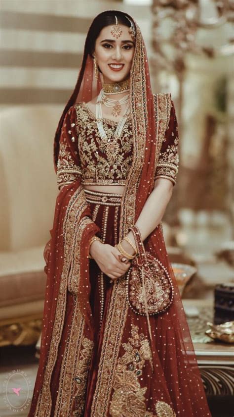 shendi bride wearing tena durrani red bridal dress asian wedding dress pakistani pakistani