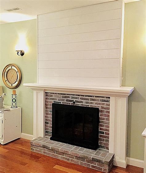 Whitewashed Bricks Shiplap Over Brick Fireplace See This Instagram