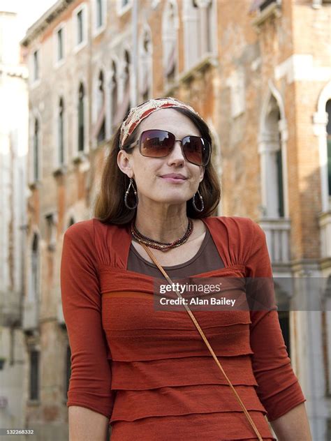 Italy Venice Mature Woman Posing In Historic Old Town High Res Stock
