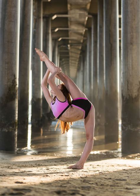 Hd Wallpaper Flexible Dancer Woman Stretching Her Leg Under Gray Concrete Bridge During