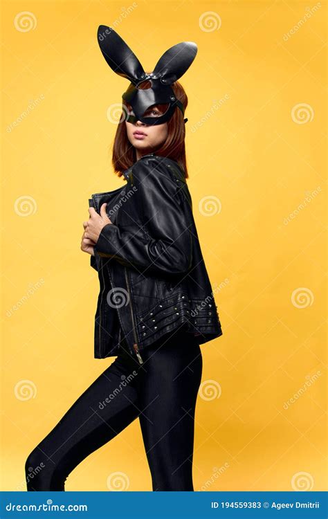 woman in rabbit mask and black suit temptation stock image image of chic carnival 194559383