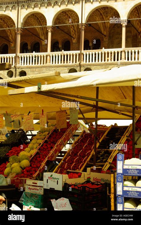 Padua Padova Italy Fresh Fruit And Vegetable Market In Piazza Delle Erbe With The Palazzo