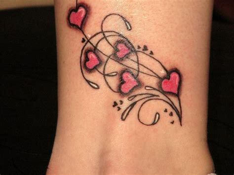 Heart tattoos — a classic tattoo design standard. 5 Intertwined Hearts Tattoo - tattoo design