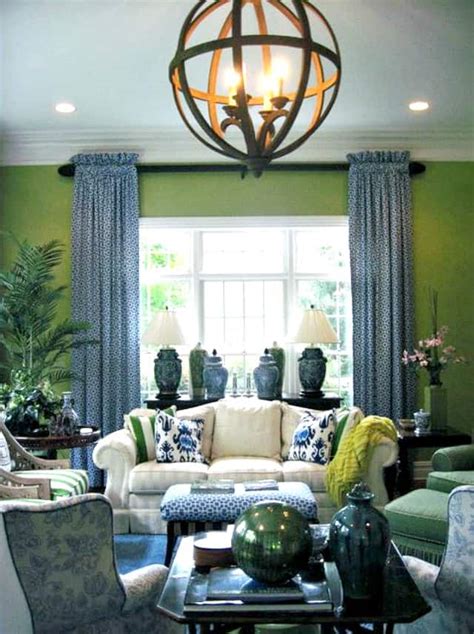 This living room features blue accents like the blue bird paper weight and the blue armchairs. 5 On Friday: Green And Blue Living Room Decor | Worthing Court