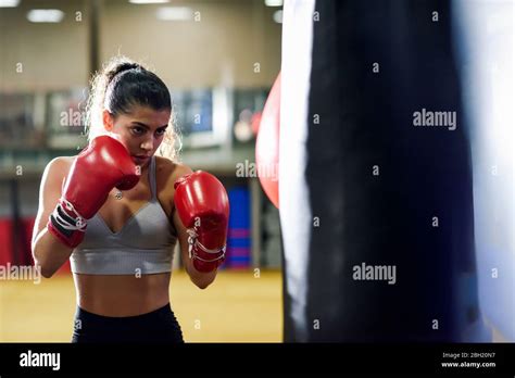 Female Boxer Punching Boxing Bag Hi Res Stock Photography And Images