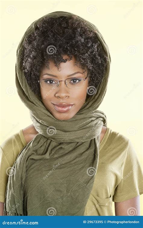 Portrait Of A Smart African American Woman Wearing Glasses With Stole Over Her Head Stock Image