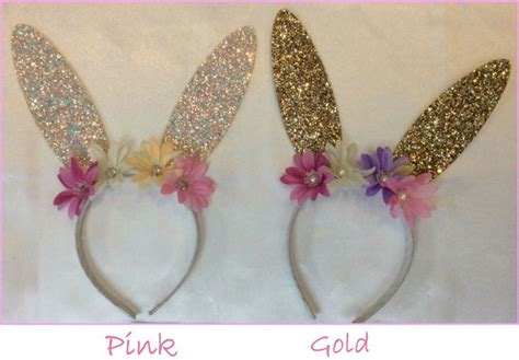 Two Bunny Ears Are Decorated With Flowers And Glitter For The Headbands