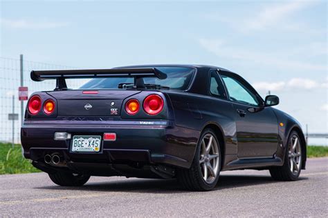 there s a midnight purple r34 nissan skyline gt r v spec for sale in the us auto inshorts
