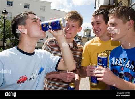 Group Of Teenage Boys Drinking Cans Of Beer Stock Photo Alamy