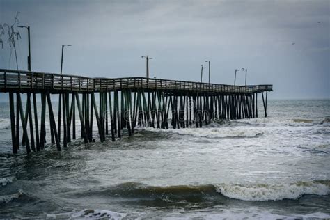 Waves In The Atlantic Ocean And The Fishing Pier In Virginia Beach