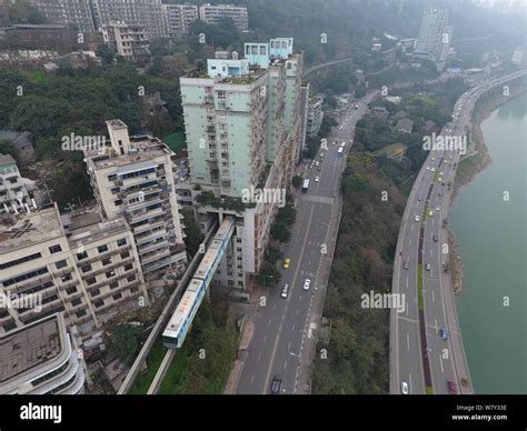 A Subway Train Of Chongqing Light Rail Line Arrives At The Liziba