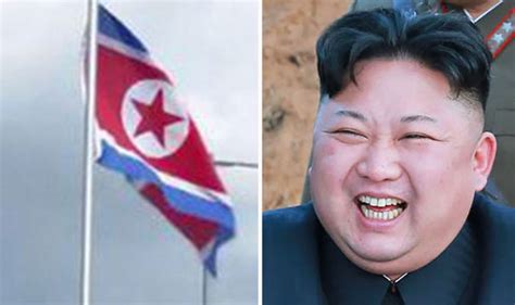 North koreans wave flags in front of portraits of kim il sung, left, and kim jong il during celebrations to mark the 100th birth anniversary of kim il sung in pyongyang in april 2012. North Korea: Kim Jong-un's 'Secret nuclear base?' Flag flying outisde UK home | UK | News ...