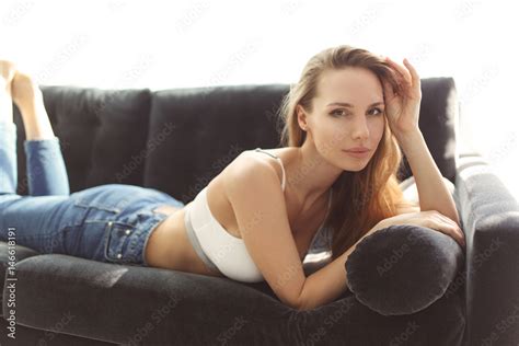 Sexy Girl Lying On Sofa Stock Photo Adobe Stock