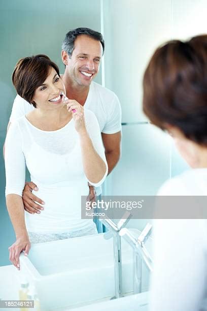 Husband And Wife Sharing Bathroom Photos And Premium High Res Pictures