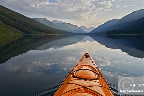 Kayaking On Cameron Lake Waterton Stock Photo