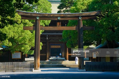 Wooden Torii Gate With Imperial Chrysanthemum Crest At Sacred