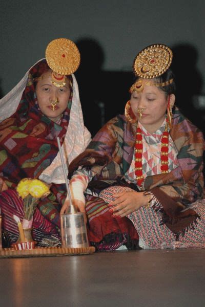 limbu women with traditional clothing and traditional tongba drink nepal culture nepali