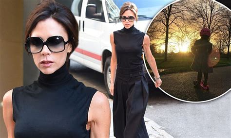 Victoria Beckham Shows Off Her Figure In Head To Toe Black During Day