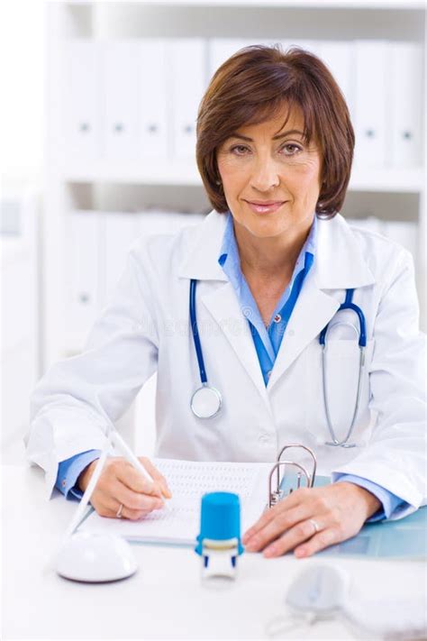 Female Doctor Working At Office Stock Image Image Of Confident