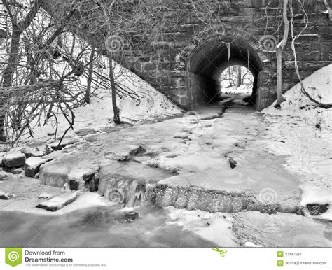Tunnel With Snow And Ice Filled Stream Stock Image Image Of Frost
