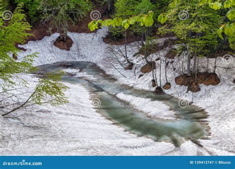 Small Icy Eight Shaped Mountain Lake At Spring Beautiful Scenic