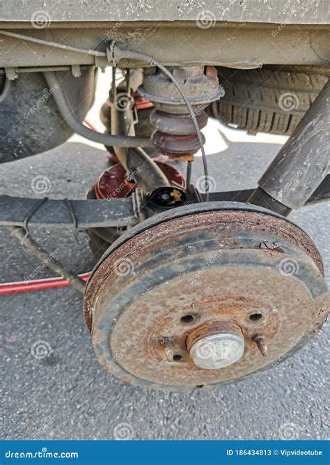 Old Car Suspension Parts in Sunny Day Stock Image - Image of dirty