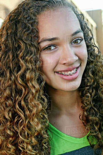 Mixed Race Girl Smiling Stock Photo Dissolve