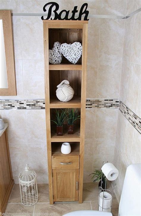 This fantastic cupboard offers invaluable hidden storage and is a beautiful piece of furniture. Oak Bathroom Furniture Tall Cabinet Cupboard Shelving ...