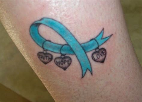 Double cancer ribbon tattoos inked on shoulder, they are ovarian cancer ribbon tattoos. Pin on Tattoos