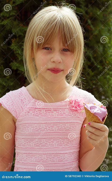 Girl 6 Years Old In A Pink Dress With Ice Cream Stock Photo Image Of