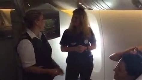 Travel El Al Flight Attendant Surprises Deaf Passengers With Service In Sign Language Sign