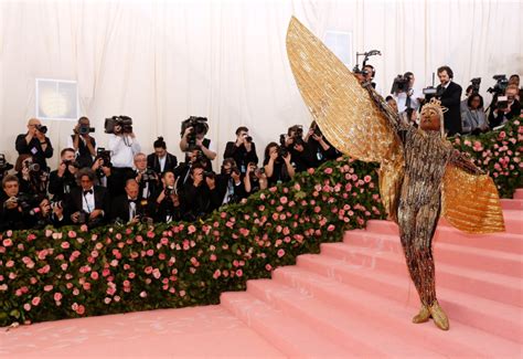 At The Met Gala ‘extra Feathers Bling And Susan Sontag Pbs Newshour